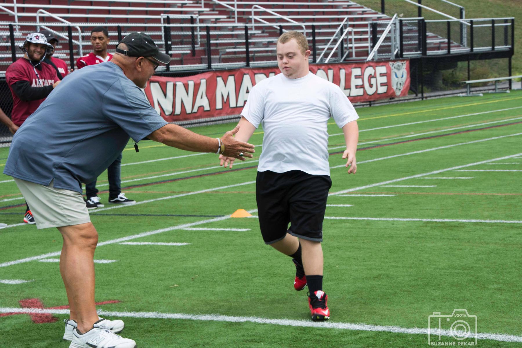 Football Hosts Special Olympics Teams from Seven Hills for Skills Clinic
