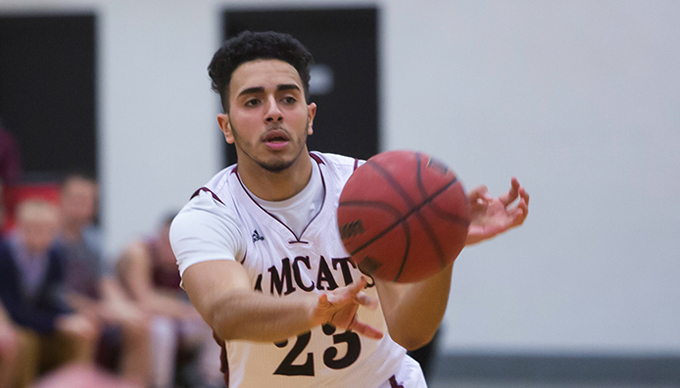 Men's Basketball Charges Past Rivier, 74-65